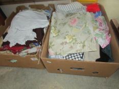 2 boxes of assorted textiles.