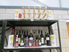 A mixed lot of wines etc and a wine rack.