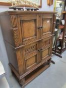 A good quality oak drinks cabinet.