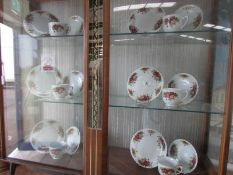 An 18 piece rose decorated tea set.