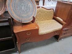 A French style telephone seat.