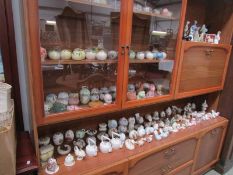 A large collection of porcelain pomanders.