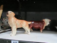 A Melba ware bull and a labrador.