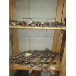 2 shelves of assorted spanners.