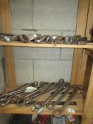 2 shelves of assorted spanners.