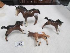 3 Beswick horses (2 A/F) and a Beswick cow, a/f.