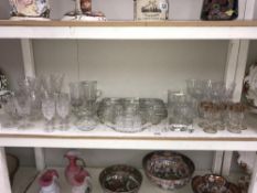 A shelf of glass ware.