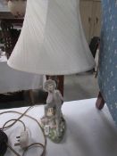 A figural table lamp.