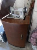 A cabinet sewing machine.