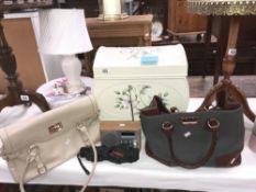 A miscellaneous lot being 2 hand bags, a table lamp, a radio, a painted wooden box,