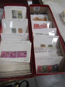 2 trays of European stamps all in envelopes.