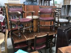 An oak dining table and 6 chairs.