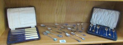 A shelf of assorted cutlery.