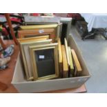 A quantity of small gilded photograph and picture frames.