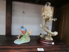 A porcelain Kingfisher and a Sherratt and Simpson eagle.