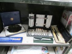 A mixed lot of cased cutlery including fish set and a boxed Coalport dish.