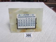 A marble perpetual calendar.