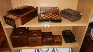 2 shelves of assorted boxes and cannisters.