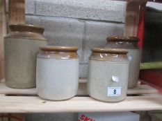 4 stone ware jars.