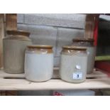 4 stone ware jars.