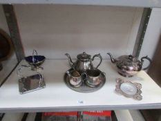 A 3 piece silver plate tea set and other silver plate items (1 shelf).