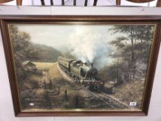 A framed and glazed print of a steam locomotive.