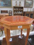 A musical inlaid sewing table.