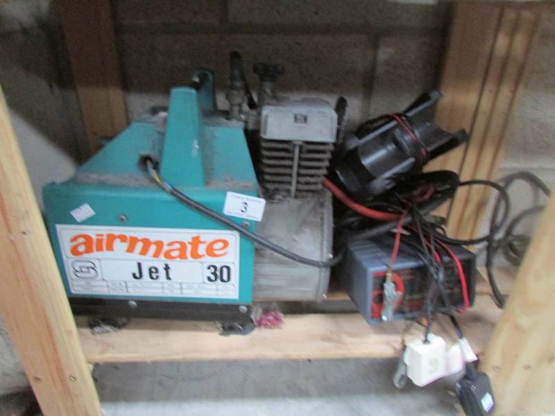 An electric 'Airmate Jet 30' car pump and 2 car battery chargers.