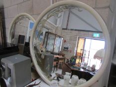 A pair of circular mirrors.