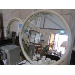 A pair of circular mirrors.