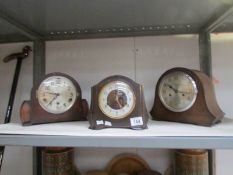 3 mantel clocks.