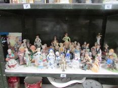 A large collection of assorted figures (one shelf).