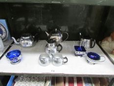 A mixed lot of metal tea ware etc.