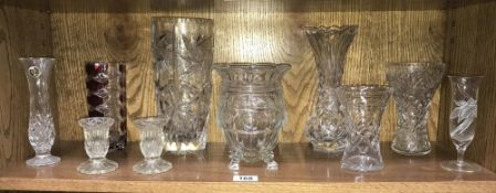 A shelf of assorted glassware.