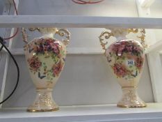 A large pair of vases, one a/f.