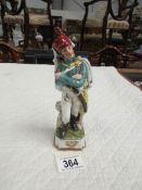 A porcelain figure of a French soldier.
