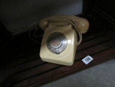A vintage dial telephone.