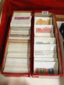 2 trays of assorted stamps in packs.