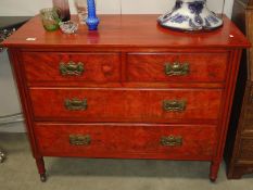 A 2 over 2 mahogany chest of drawers.