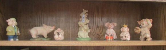 7 pig figures including Piggin'.