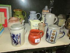 A mixed lot including pub jug, beer steins, tankards etc.