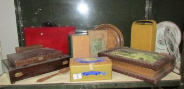 A shelf of miscellaneous boxes etc.