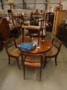 5 inlaid dining chairs.