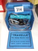A 'Travella' travelling iron.