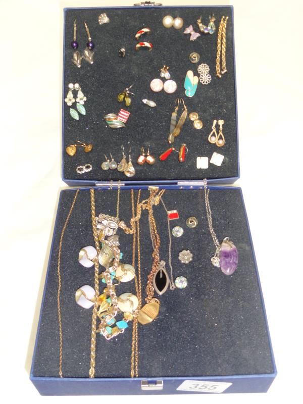 A quantity of necklaces and earrings.
