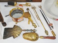 A mixed lot of brassware including shovel, toasting forks etc.