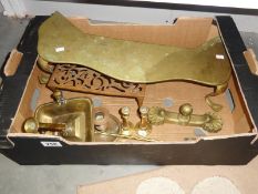 A box of assorted brass ware.