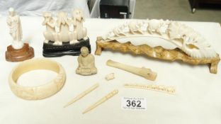 A tray of carved bone items.