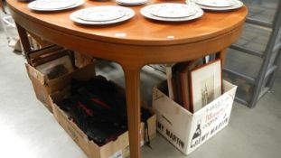 A teak dining table.