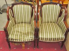 A pair of Victorian mahogany tub chairs.